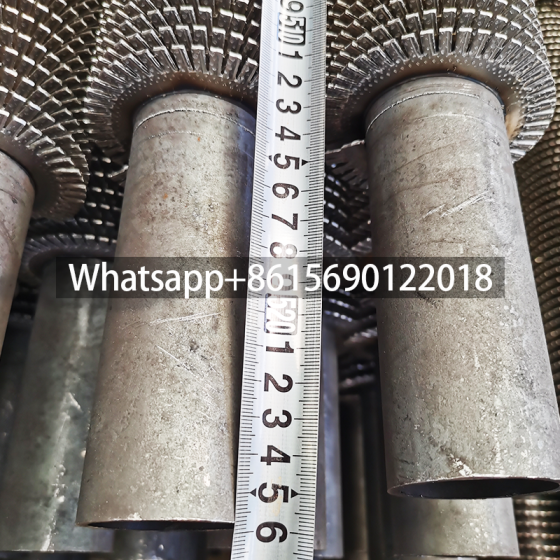 Welded spiral serrated fin tube for heat exchanger
